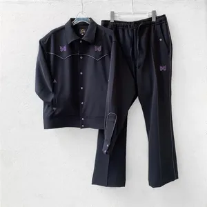 Calça masculina agulhas tubula de cowboy homens mulheres calças de moletom de borboleta bordados dentro da etiqueta de etiqueta