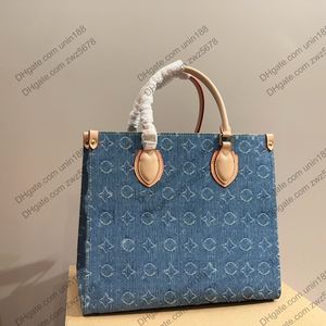 23FW Designers Mulheres Couro bolsas de casca de couro OnThGo de alta qualidade Denim Bolsa azul shouder Bolsa de compras cruzadas Bolsa de viagem Mensageiro de luxuros Bolsas de viagem 35cm