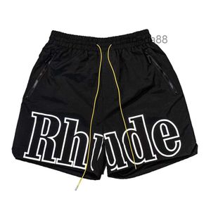 Designer Mens Shorts Rhude Short Beach Mesh Street Sweatpants Basketball Men Limited Swim Kne Length Hip Hop Hop Hop Sports Training Elastic midja 1AS8