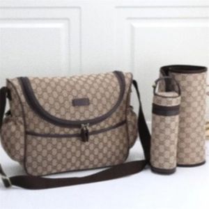 Väskor mamma baby blöja väska 3 -stycken set hög kvalitet designer tryck multifunktionell axelväska mamma och tjej gåva kreativ A06