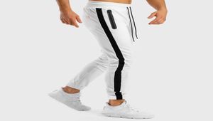 Men039s pantaloni da matita bianca uomo slim cotone magro magro per la moda per il bodybuilding sport tasche maschi joggers a strisce 55578187