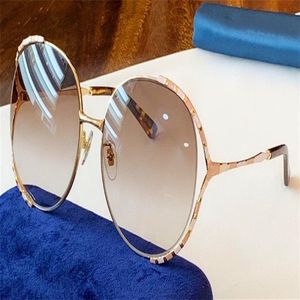 New fashion designer women sunglasses 0595 large frame round hollow frame simple popular glasses top quality uv400 lens outdoor ey278n