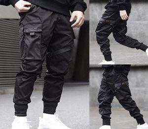 Men fibbons Block Color Black Pocket Cargo Pants 2019 HAREM JOGGERS HARAJUKU SORLE SORLE HIP HOP TRUSHERS F12106955398