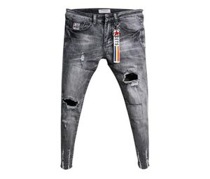 Ganze Mode lässige Teenager Cowboy Korean Trendy Knie Ripped Loch Röhren -Jeans Herren Raw Edge Mode Stretch Hosen 2011116926082