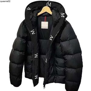 Herren Down Parkas Mens Jackets Pufferjacke Maya Serie Outdoor Halten Sie warme schwarze Oberbekleidung Kaltschutz Abzeichen Dekoration Verdickung Luxusmantel Plus Größe