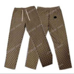 21SS Herrkvinnor Jacquard Pants Män klär banträder Affär Casual Slim Fit Suit Pants Lattice Letter Mönster Byxor High Qua8896648