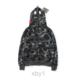 Herren Designer Hoodies für Frau Schwarz Camouflage Jacke Hoody Kapuzenhaube Langarmmann Mann Frauen warmes Tech Fleece Strickjacken XJCB XJCB