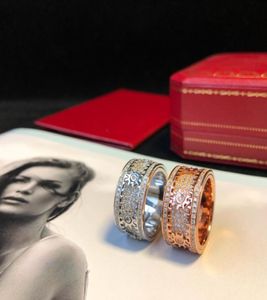 Luxurys designers Ring Gear Rings for Women Men Full Diamond Engagement smycken Gears kan vända casual Party9878955