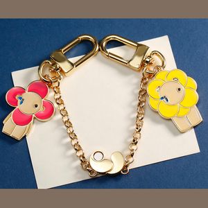 Fashion Womens Mens Keychain Designer Couples Cute Key Keyring Double Doll Pendant with Magnetic Buckle Chain Bag Charm Accessories CSD2312258