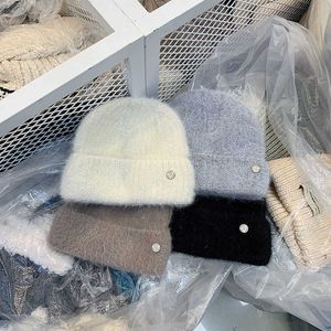 Abnehmbare kleine Knopfdekoration gepaart mit runden gestrickten Hut für Frauen Winter Neukoreanische Version Internet berühmte Instagram Minimalistische Wollhut