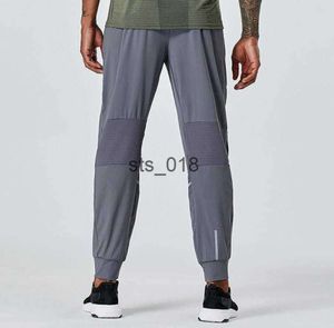 LL Yoga outfit Men's Jogger Long Pants Sport Outdoor för att köra Yogo Gym Pockets Sweatpants Byxor Mens Casual Elastic Midje Fitness T299