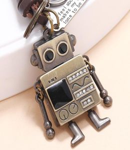 Anahtarlıklar vintage uzuv hareketli robot anahtarlık kadınlar yaratıcı metal anahtar kolye anahtarlar erkekler el dokuması cowhide deri araba zinciri9442551