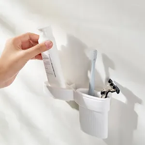 Kök förvaring tandkräm rack pressa artefakt badrum toalett väggmonterad gratis stansning ansiktsrengöringsklipphängare