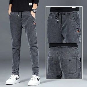 Primavera Autunno Coulisse Baggy Uomo Designer Vita bassa Moda coreana Denim Luxury Brand Elegante Jogger Jeans casual 231222