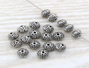200 pezzi di perle a distanza piatta in lega di zinco argento anticato 7 mm per gioielli che producono reperti di braccialetti D45926812