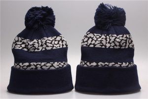 Unisex 23 trendige Hüte Winter gestrickte Poms Beanie Label Luxus Kabel Slouchy Skull Caps Mode Freizeit Beanie Outdoor Hüte9774932