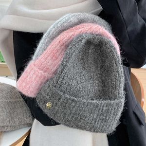 Korean solid color round knitted sweater hat for women in autumn and winter to show off their face small windproof hat ins warm pile hat