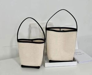 Designer a linha Bolsa balde de lona Bolsa feminina desleixada nas axilas Bolsa de ombro elegante de grande capacidade Bolsa de viagem Casual tudo