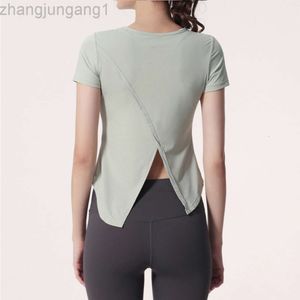 Desginer aloyoga yoga al t shirt sommar ny kvinnors sportstopp med split back mesh kostym kort ärm körning fitness cover