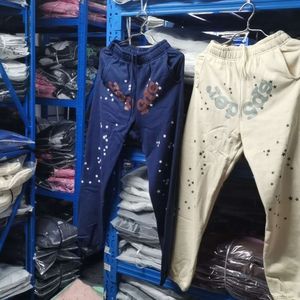Designer calças masculinas jovem bandido estrela sp5der 555555 damasco azul calça remendo retalhos calças de loop para homens e mulheres