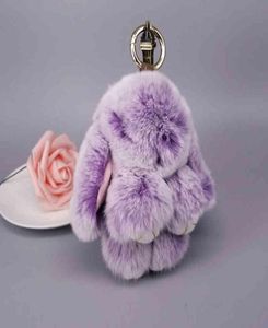 Mini Rabbit Keychain Rabbit Fur Pompom nyckelkedjor Kvinnor Väskor Dekorativa hänge bilnycklar Tillbehör Baby Plush Toys Y03063519727