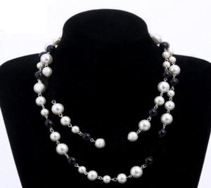 Designer smycken halsband eleganta kvinnor svartvitt pärla tröja kedja paris mode diamant halsband bröllop smycken acces3729575
