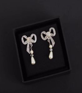 Fashion girl charm earrings Bowknot Pearl charming ear stud for women party wedding engagement lovers gift jewelry with fast deliv4583413