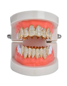 Nuevo Hip Hop Dientes Diente Grillz Cobre Circón Dientes de cristal Grillz Parrillas dentales Joyería de Halloween Regalo entero para rapero Me9895876