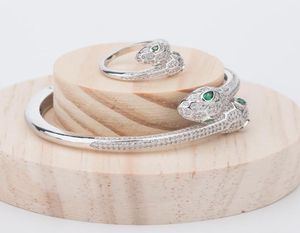 Nya modemärken smycken set lady mässing fulla diamantgröna ögon dubbel huvuden orm 18k guldarmband ringar uppsättningar (1sets) 6156326