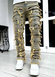男性用のプレミアムビンテージブルースタッキングジーンズ伸縮性の生の擦り切れデニムが破壊された洗浄されたパッチワークスパンツ231226