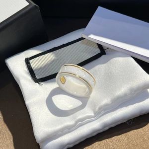 Luxurys Designer Golddraht-Keramik-Planetenring für Männer mit klarem Schriftzug, feine Verarbeitung, Verlobungsschmuck, Gold und Silber, Hochzeit, Party, Paar, Geschenke, Ringe für Frauen