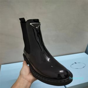 2023 كلاسيكية مثلث شعار المصمم أحذية Martin Boots 100 ٪ من الجلد الحقيقي الأزياء غير الاستخدامات متعددة الاستخدامات أحذية المصنع عالية الجودة