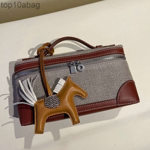 2024 Nuova tela impiombata pelle bovina LP19 Lunch Box Bag Alla moda e semplice portatile una spalla Crossbody piccola borsa di alta qualità