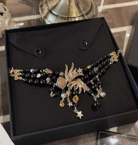 2021 marca gioielli di moda donna perle gioielli per feste perline di cristallo nero spettacolo di primavera design stella gialla fiocco di neve di lusso6391243