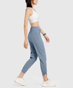 LL Donna Yoga Nono Pantaloni Push Fitness Pantaloni da jogging Pantaloni morbidi a vita alta con coulisse casual 7 colori L2024