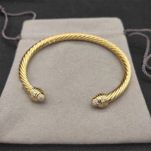 Topp Bangle smycken rostfritt stål vridna armband kabeltrådarmband för kvinnor som säljer öppen manschettantik