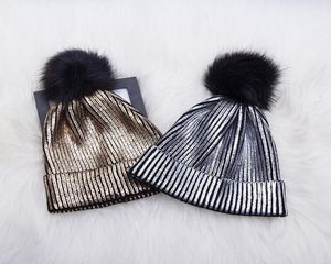 Cappello a cuffia lavorato a maglia all'uncinetto lavorato a maglia metallizzato caldo invernale da ragazza da donna con pom pom argento oro Nuovo15218126