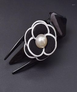 Wholesale Korean fabric adult large black word mouth claw clip simple pearl camellia flower hair female hair accessories17777873