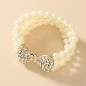 Nowa barokowa imitacja imitacja Pearl Bransoletka Metal Gold Bow Rhinestone Bracelets For Women Party Jewelry Akcesoria1310k