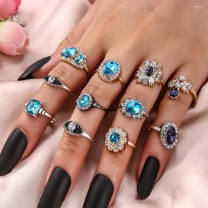 Küme halkaları 8pcs boho tarzı takı seti kakma mavi rhinestone modaya uygun çiçek asma tanrı güneşli desenler.