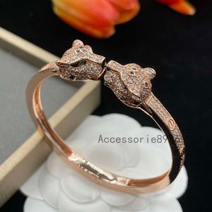 Women's bracelet Fashion personality High quality designer style Animal Diamond car Open hard body bracelet New huayu men with the same couple style