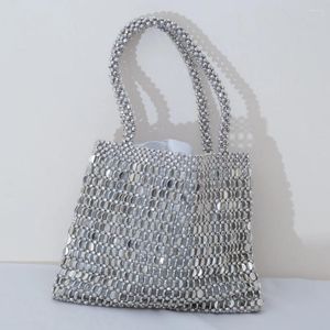 Kvällspåsar nisch design vintage handgjorda vävda väska pärlstav handväska kvinnlig silver tofs axel fashionabla plånböcker