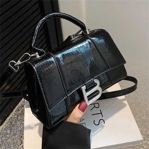 16% OFF Designer B-shaped hourglass spring and summer new product high-end glossy crocodile pattern handbag women's one shoulder crossbody bag