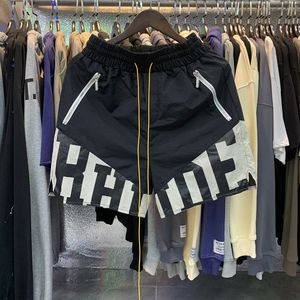 Rhude män andningsbara strand shorts kvinnor casual mesh spår överdimensionerad midja dragskon gratis frakt för svart och whiteslqsslqsslqs