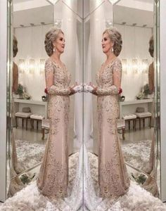 2018 Luxury Mother of the Bride Dresses V Neck långa ärmar kristallpärlade sjöjungfrun spetssapplikation plus size party kväll bröllop g3470866