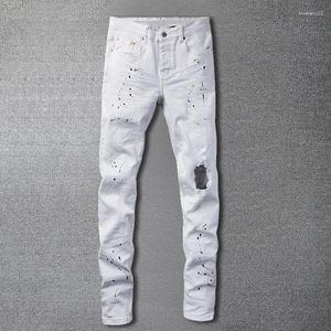 Mäns jeans lila varumärke män som stänker bläck rippat hål design jean hip hop stil stretchy byxor för motorcykelbyxa