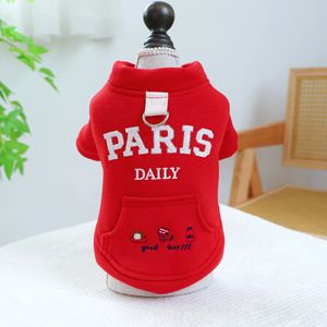 1pc Pet Apparel Dog Spring и осенью утолщенное теплое парижское карманное пальто с пряжкой для маленьких средних собак 231227