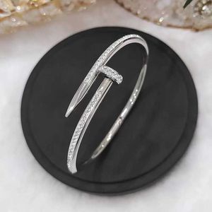 A Classic Cartres Bangle Japanese and Korean trendy fashionable nail bracelets made of titanium steel with non fading inlaid diamonds for men womens card home straig