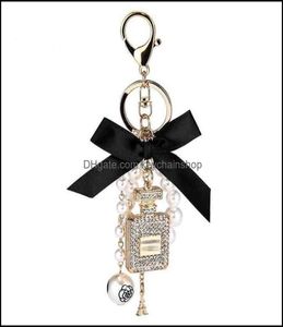 Keychains Fashion Accessories Creative Handmade Diy Diamond per flaska Alloy Bow Pearl Luxury Keychain Pures Charm Pendant YS068 1744673