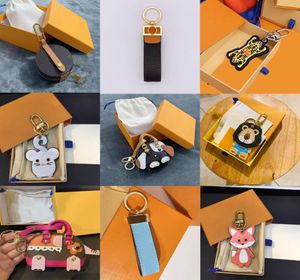 22SS Design Without Box Letter Print Cartoon Brand Designer Keychain Holder Pu Leather Animal Car Keyrings Key Chain Top High Qual1486989